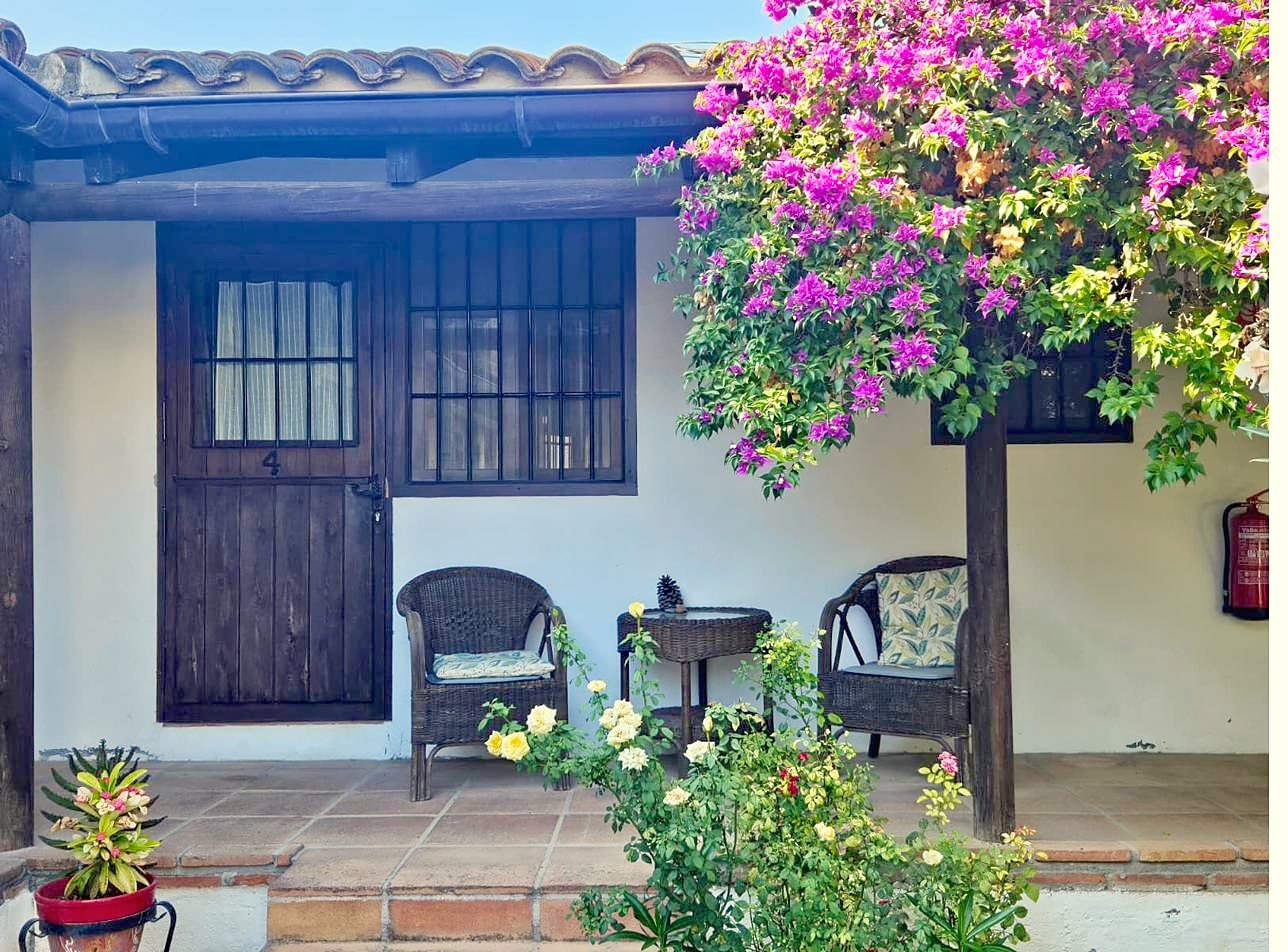 Private terrace under flowering bougainvillea